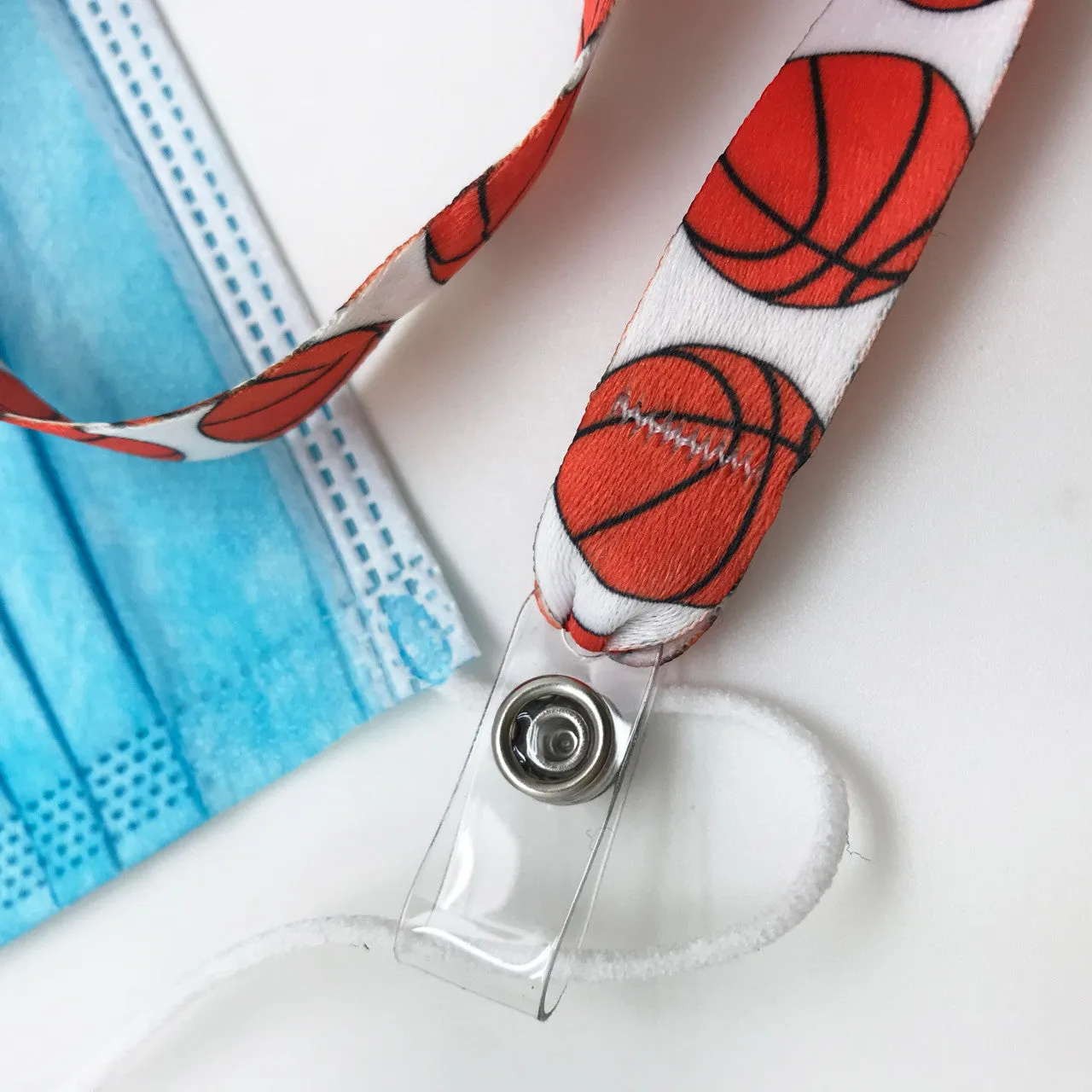 Basketball Face mask holder lanyard 24" long in theme design with vinyl snap fittings printed on 5/8" Ultra Lanyard fabric